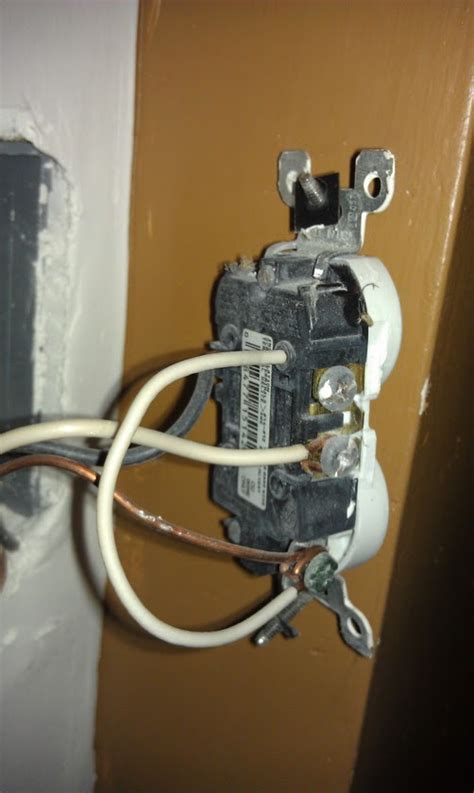 ground tied to electrical receptacle